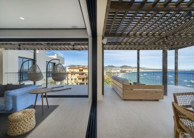 Living room opening to large balcony with Oceanview